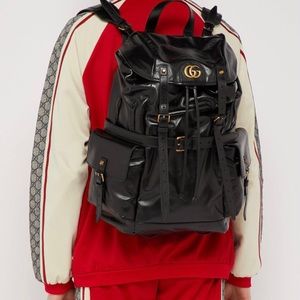 black gucci backpack with red and green strap
